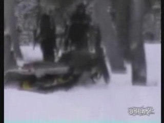 Snowmobiler Cruises Across River