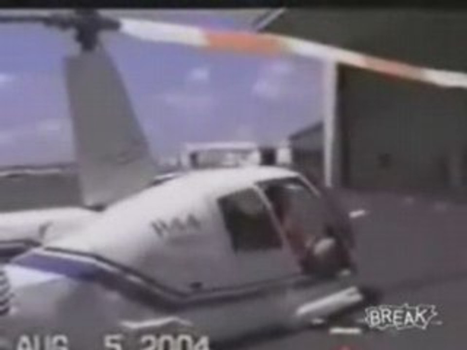 Helicopter Whacks Hanger on Takeoff