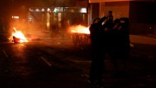 Varios detenidos tras protestas de encapuchados contra Vito Quiles e incendiar una moto policial