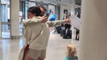 Emotional Surprise: Son's Unexpected Homecoming at Manchester Airport