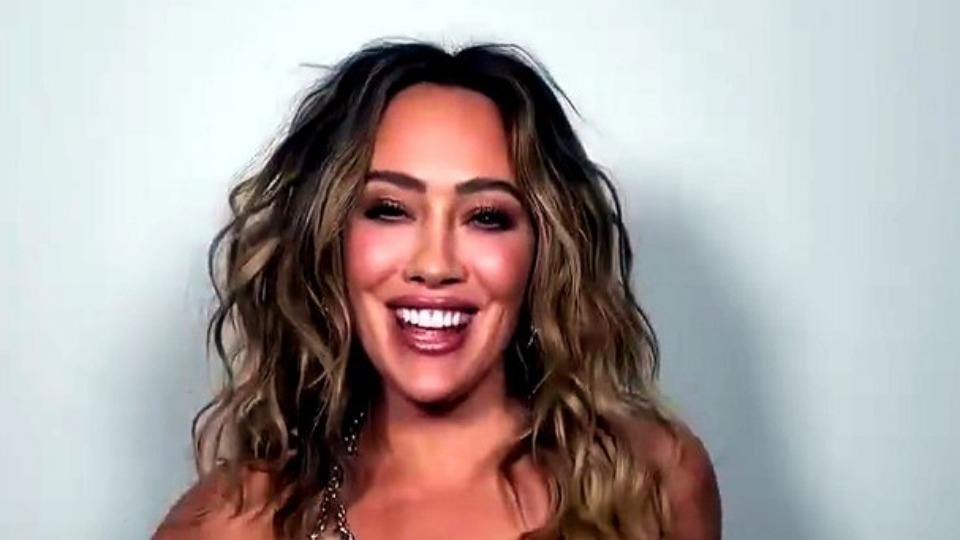 Hilary Duff looks phenomenal in see-through mini dress that glows in the dark