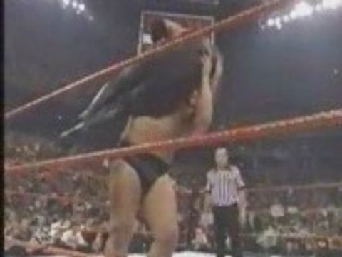 WWE - Big Show chokeslams Undertaker through ring
