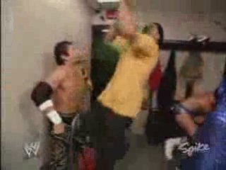 Tajiri spits mist in Coach face