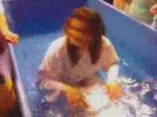 Baptême dans l'Eglise Evangelique Chrétien en Action