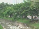 People enjoying Cali River Park near Hotels. Cali Colombia