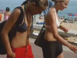 Sexy girls in bikinis at the beach