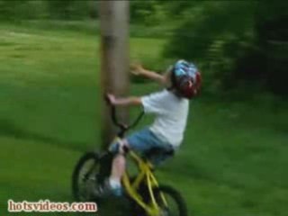 Little Kid on Bike Rides Into Pole