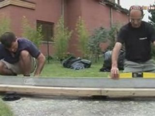 Pose d'une terrasse bois sur lambourdes et plots PVC