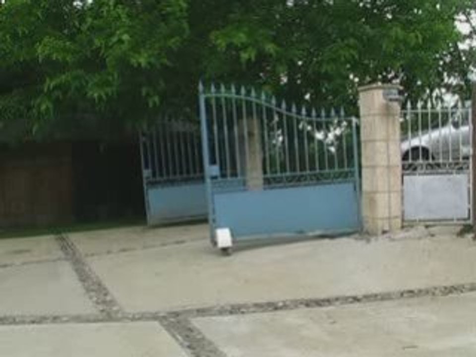 Portail 4 m legere pente