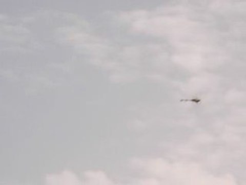 Vol trex 450 au dessus de l'eau à calvi