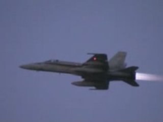 f/a-18 Hornets take-off at sunset