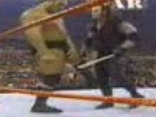 Undertaker hits big show with a baseball bat