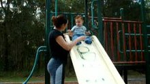 Ozan on a slide