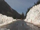 Motorcycle riding snow avalanche