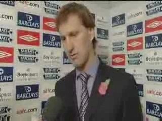 Tony Adams parlant de Belhadj