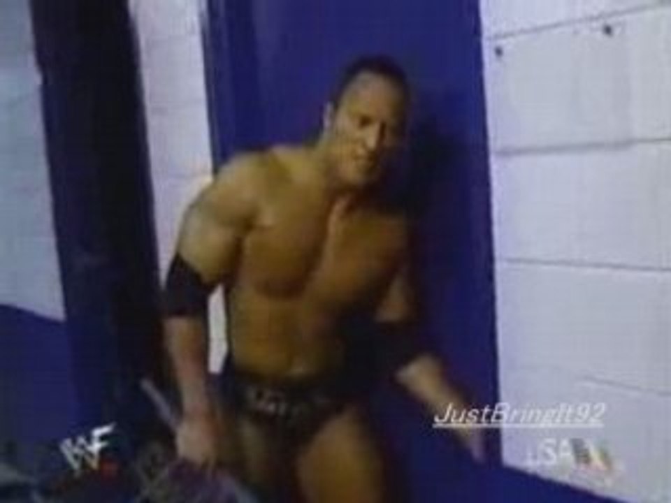 The Rock beats the hell out of Chris Benoit