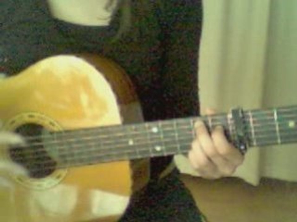 1er essai à la guitare avec capodastre: Mlle chante le blues