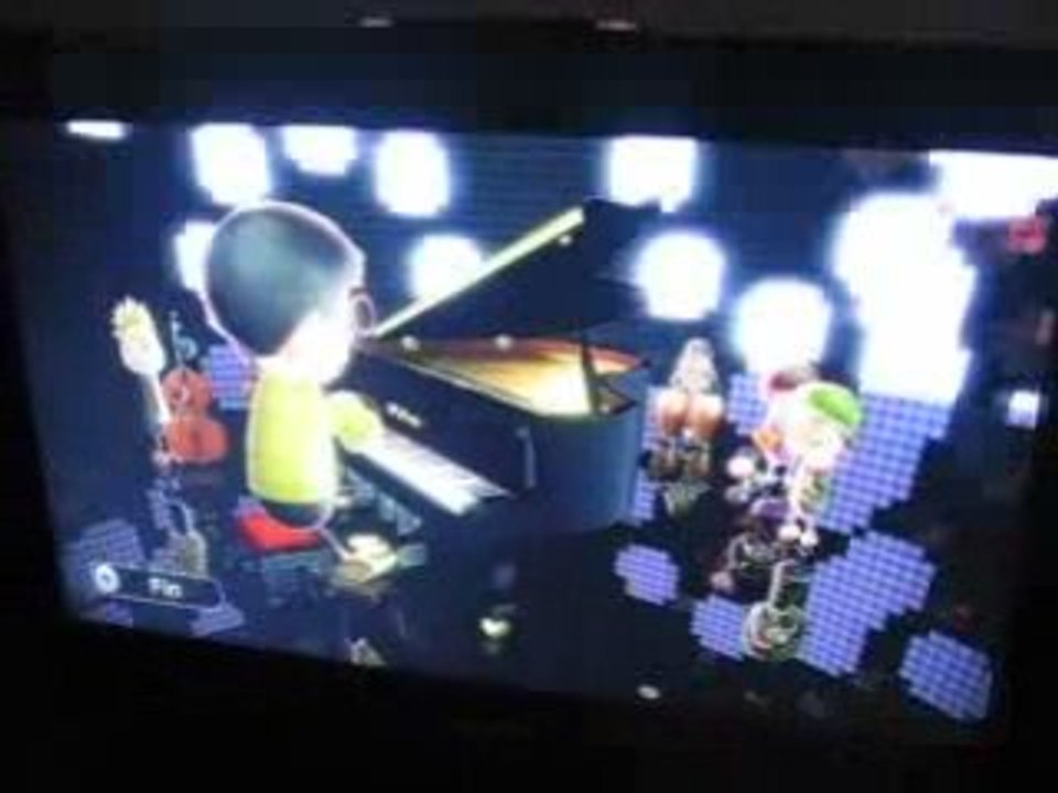 Nathan joue à WII Music