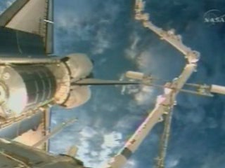 Shuttle Endeavour docks with space station