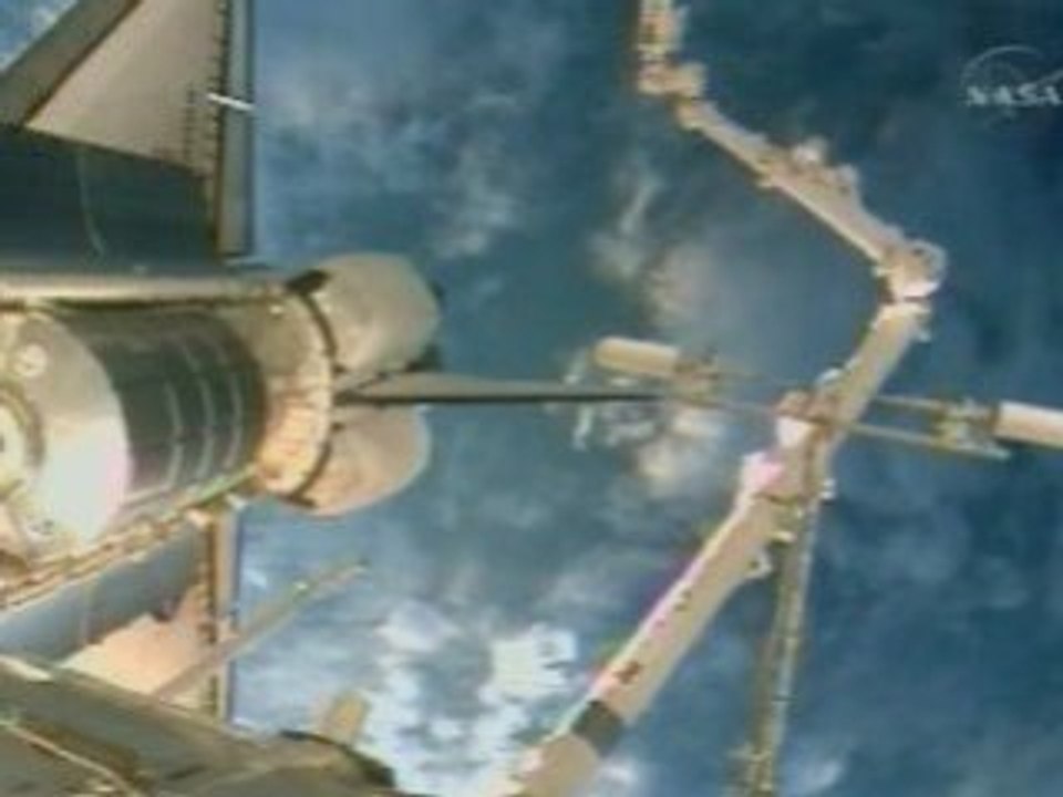 Shuttle Endeavour docks with space station