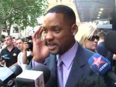 Ben Stiller and Chris Rock met fans on the wet carpet