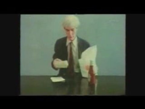 Andy Warhol Eating A Hamburger