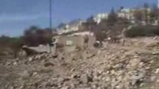 Israeli Terrorist Settler Shooting Palestinians in Hebron