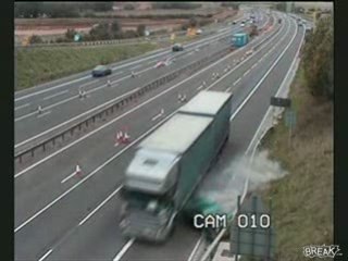 Truck-drives-car-off-the-road