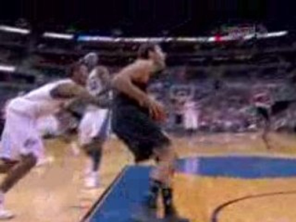Rudy Fernandez throws up a prayer.