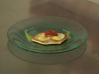 Lunette d'œuf de caille à la tomate confite