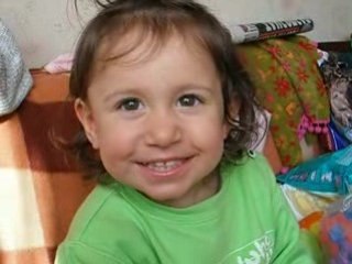 Elizabeth 1 year 6 months - having a funny breakfast