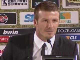 David Beckham greets fans and the press at AC Milan