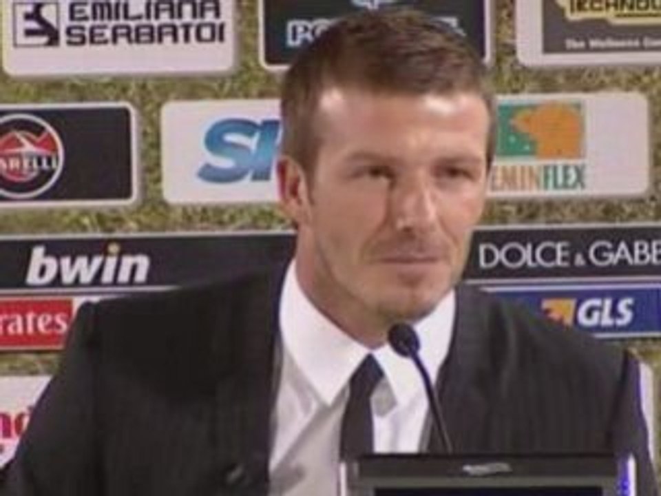 David Beckham greets fans and the press at AC Milan