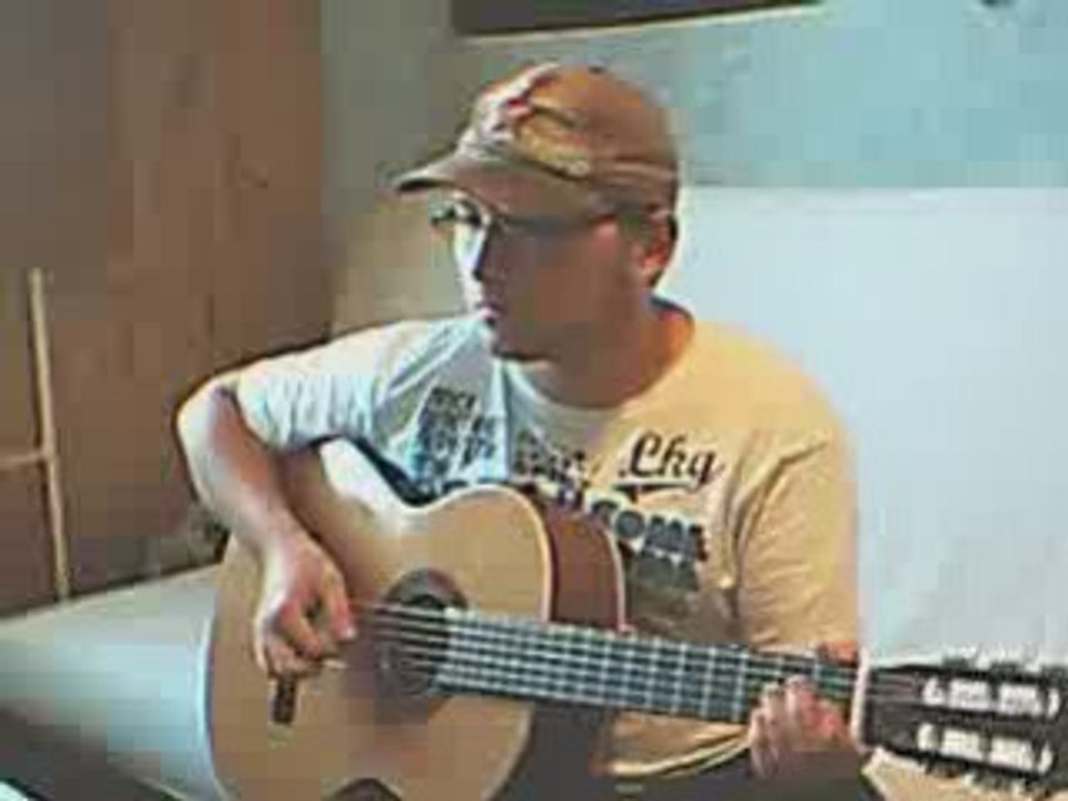 Marie (Johnny Hallyday) a la guitare acoustique
