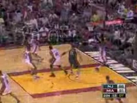 Dwayne Wade blocks on 7-footer Brook Lopez and Vince Carter