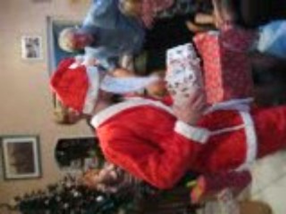 Le père Noel vient voir Mélina