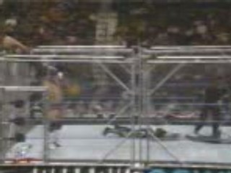 WWE - Billy Gunn Backdrops Jeff Hardy Over Cage