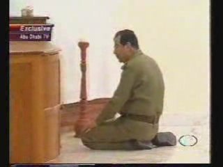 saddam Hussein Pray before the 2003 war.