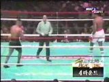 (boxe Mike Tyson vs. Larry Holmes