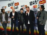 Elbow celebrate winning a Brit Award