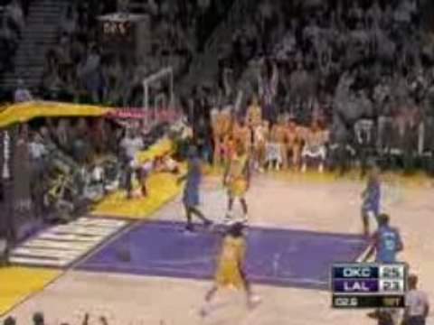 NBA Kobe takes the long pass from Lamar Odom and flushes it