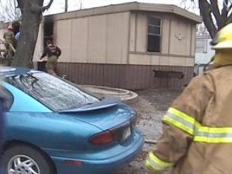 Muskogee FD puts out mobile home blaze.