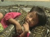 Kid Rides Giant Python