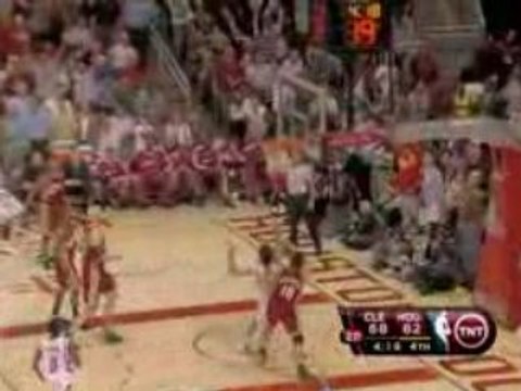 NBA Yao Ming blocks LeBron James underneath the basket which