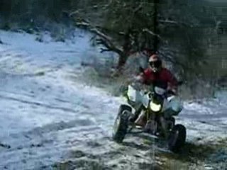 martial en quad dans la neige