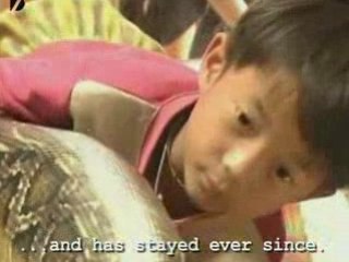 Kid Rides Giant Python