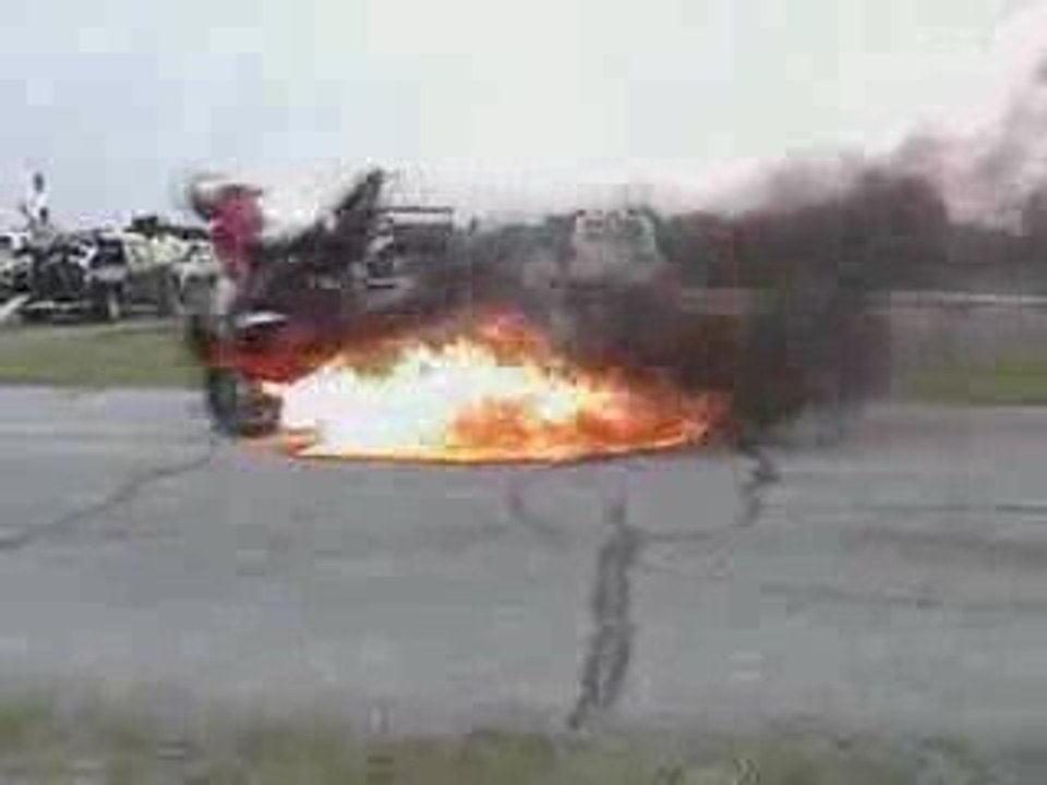 burn wheeling stoppie moto