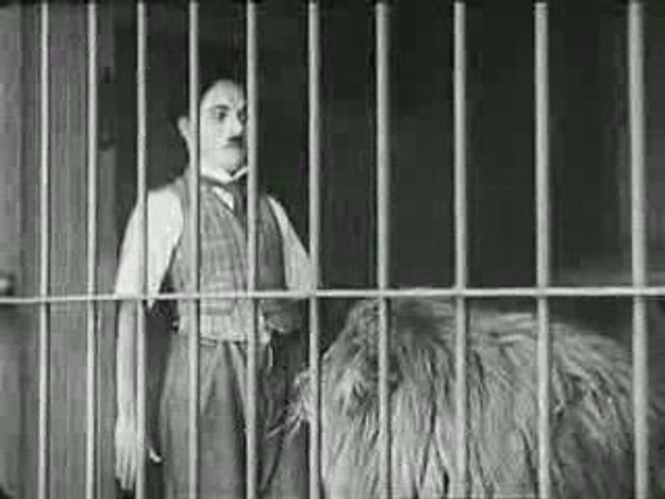 -Charlie_Chaplin___The_Lion's_Cage_cav