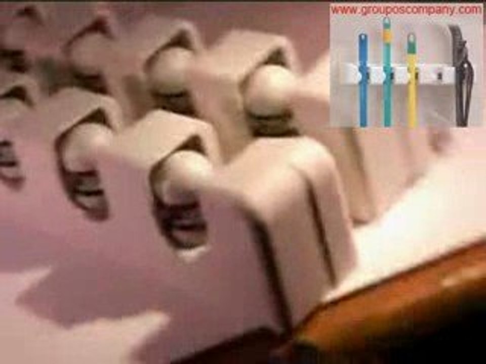 The Magic Holder mop and broom holder organizer