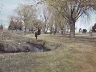 Milson steals a frisbee wearing a Burger King mask